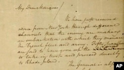 Foto yon plent biwo komise gouvenman Boston an voye bay yon tribinal federal an 2019 montre yon let Alelxander Hamilton te voye bay Marquis de Lafayette an 1780 ke yo te vole nan achiv Massachusetts la sa gen plizye dizen lane. 